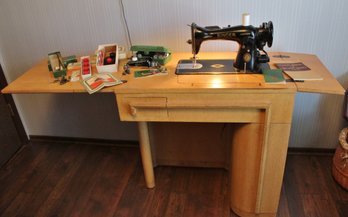 Vintage Singer Sewing Machine In Unusual Cabinet.  Includes Books And Lots Of Accessories, Great Shape