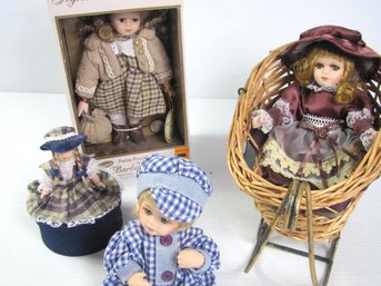 4 Small Porcelain Face Dolls - One Is Box Cover, One Still In The Box, Little Boy Is Jointed, Girl In Carriage