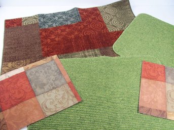 Three Small Rugs And Two Place Mats