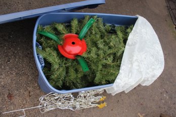 50 Gallon Tote With Cracked Lid With Older Christmas Tree -believe It Is 6.5 Ft