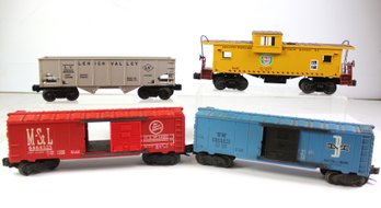 4 Lionel O Scale -two Box Cars, One Hopper Car One Caboose
