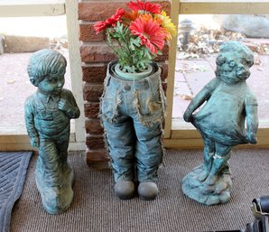3 Yard Art Pieces, Boy And Girl Are Concrete, Jeans Are Not.  Girl Has Been Reglued