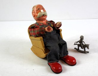 Tin Vintage Marusan Old Man Smoking And Pewter John Sullivan, Needs Oil And Batteries Missing Nose
