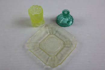 Three Pieces Of Vaseline Glass, Candlestick Holder, Toothpick Holder And Small Plate