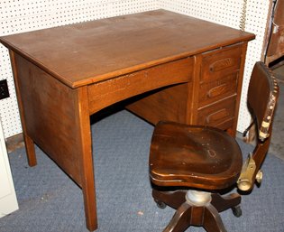 Vintage 3 Drawer Wood Desk 42-in Wide X29.5 With Wood Chair On Rollers, 2nd Drawer On Desk Is Locked