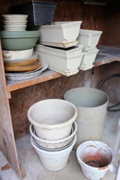 Lots Of Plastic Pots And One Clay Pot