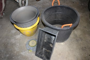 Plastic Pots And A Sprinkler