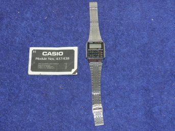 VINTAGE CASIO CA-502 CALCULATOR WATCH AND MANUAL NEEDS BATTERY