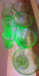 Two Sets Of Green Glasses