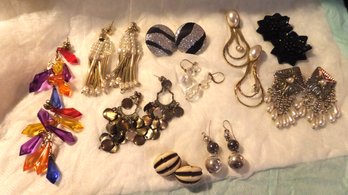 12 Pair Of Pierced Earrings