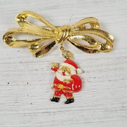 Vintage Phister Ent 1996 Santa On Bow Brooch Christmas Holiday Theme Classic Costume Jewelry