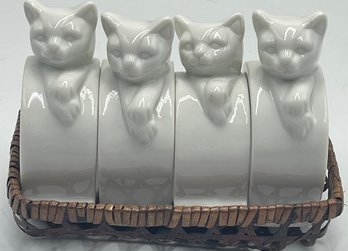 Set Of 4 Porcelain Kitten Napkin Rings In Wicker Basket