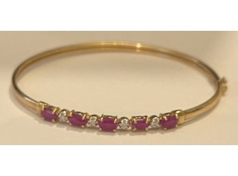 Splendid 10 Karat Yellow Gold Ruby And Diamond Bangle Bracelet