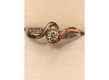 Elegant Diamond Solitaire In Silver And Gold