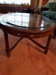 Oval Wood And Glass Coffee Table - 44x30