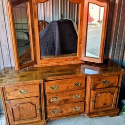 9 Drawer All Wood Dresser With Mirror.