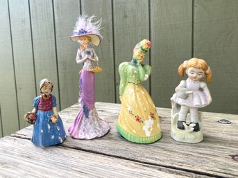 4 Little Lady Statues