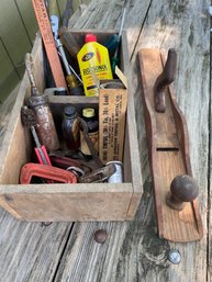 Old Box Of Random Tools And Decorative Plainer