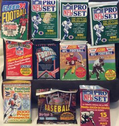 11 Packs Of Assorted Sealed Football And Baseball Cards - M