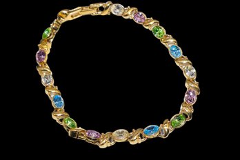 Beautiful Gold Tone Bracelet With 16 Different Color Rhinestones