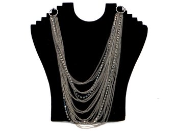 A Must Have! Stunning Silver Tone Necklace With 25 Strand Chains!