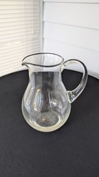 CLEAR GLASS HANDLED PITCHER JUG W/ CURVED SPOUT