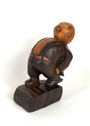 Wood Carving Of Walking Man