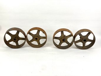 Four Antique Cast Iron Wheels