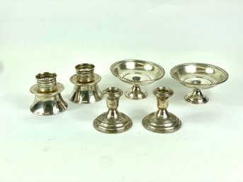 Six Pieces Of Weighted Silver
