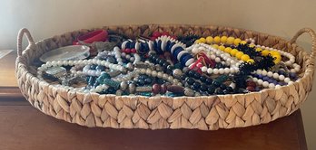 Lot Of Costume Jewelry In Basket