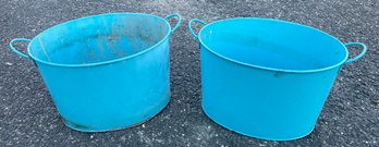 Two Oval Metal Bins