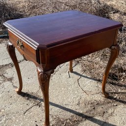 A Mahogany End Table With Drawer