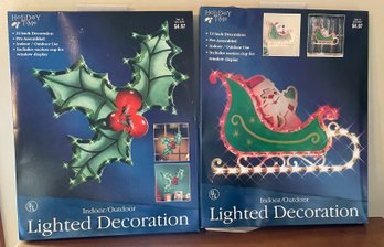 Pair Of Lighted Christmas Decorations