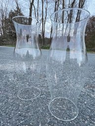 A Pair Of Large Hand Blown Glass Chimneys