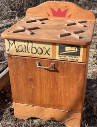 A Wooden Kids Stove And Mailbox