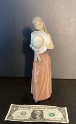 Retired Lladro Bashful  Girl With A Hat