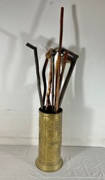 Collection Of Antique Canes And Brass Embossed Umbrella Stand