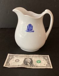 Vintage Ironstone Pitcher From The Syracuse, China Company Showing The Cheshire School Coat Of Arms,