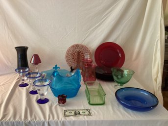 Colorful Lot Of Various Plates And Other Glassware