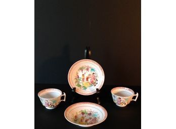 2  Antique China Deep Saucer And Tea Cup Set With An Asian Theme.