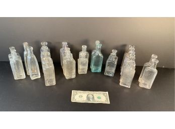 26 Assorted Vintage Embossed Medicine Bottles