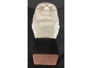 Marble Head Of A Young Woman With Wooden Base. Signed And Numbered 74/500