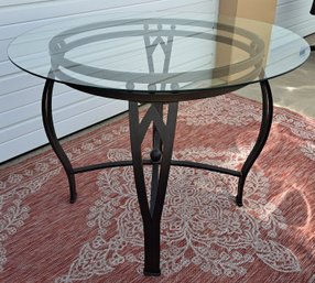 Glass Top Metal Table 40 Inches In Diameter