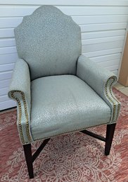 Beautiful Aqua Color Occasional Chair With Dark Wood Legs And Nail Studs