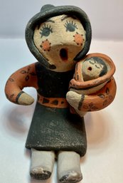 Small Pueblo Pottery 'Storyteller' Holding Her Baby And Signed (Illegible)--3 Inches Tall