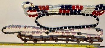 Four Beaded Necklaces Of Different Colors