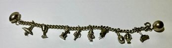 A Charm Bracelet With Symbols Of Many Activities! (silver Metal, But Not Sterling Silver--maybe Pewter?)