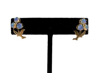 A Pair Of 14k Gold & Opal Earrings