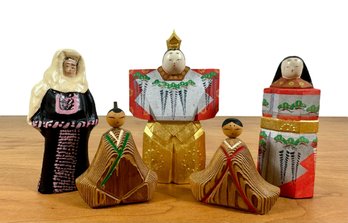 A Grouping Of Hand-Painted Dolls