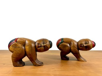 A Pair Of 'opium Pillow' Crawling Children Sculptures